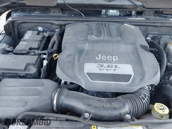 2012 Jeep Wrangler Sahara z VIN 1C4GJWBG4CL164203, wystawiony jako IAAI lot #41428441 z przebiegiem 94 776 mil mil oraz . Historia ofert i sprzedaży dostępna na DreamBid. Obrazek 10.