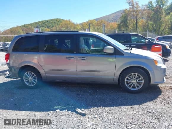 2014 Dodge Grand Caravan SXT 30th Anniversary with VIN 2C4RDGCG8ER264271, listed as a IAAI auction lot 43429914 with 112,894 mi miles and . Bid and sale history available at DreamBid. Image 14.