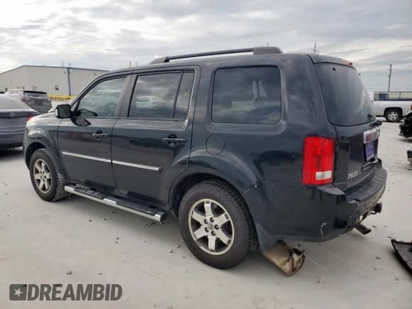 2009 Honda Pilot Touring with VIN 5FNYF48809B035719, listed as a Copart auction lot 63201775 with 202,385 mi miles and Salvage title. Bid and sale history available at DreamBid. Image 2.