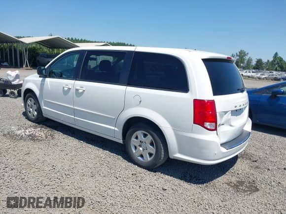 2012 Dodge Grand Caravan American Value z VIN 2C4RDGBG5CR420149, wystawiony jako IAAI lot #42454884 z przebiegiem 130 512 mil mil oraz . Historia ofert i sprzedaży dostępna na DreamBid. Obrazek 3.