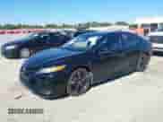 2020 Toyota Camry XSE with VIN 4T1KZ1AK3LU045091, listed as a IAAI auction lot 43425913 with 65,869 mi miles and . Bid and sale history available at DreamBid. Image 2.