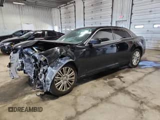 2014 Chrysler 300 с VIN 2C3CCARG2EH328022, выставлен на аукционе Copart как лот 69790415 с пробегом 160 394 миль миль и На запчасти • Non repairable. История ставок и продаж доступна на DreamBid. Изображение 1.