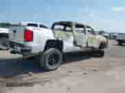 2015 Chevrolet Silverado 2500HD Work Truck z VIN 1GC1KUEG0FF156704, wystawiony jako IAAI lot #42683155 z przebiegiem Nie podano mil oraz . Historia ofert i sprzedaży dostępna na DreamBid. Obrazek 4.