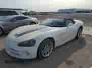 2005 Dodge Viper SRT-10 with VIN 1B3JZ65Z05V501809, listed as a Copart auction lot 89334135 with 19,563 mi miles and Salvage title. Bid and sale history available at DreamBid. Image 1.