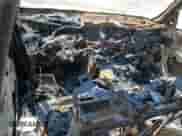 2002 Chevrolet Suburban LT z VIN 3GNGK26G12G301147, wystawiony jako Copart lot #65392395 z przebiegiem Nie podano mil oraz Szkoda całkowita • Salvage title. Historia ofert i sprzedaży dostępna na DreamBid. Obrazek 8.