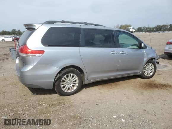 2014 Toyota Sienna XLE with VIN 5TDYK3DCXES426267, listed as a Copart auction lot 81193765 with 142,543 mi miles and Salvage title. Bid and sale history available at DreamBid. Image 3.