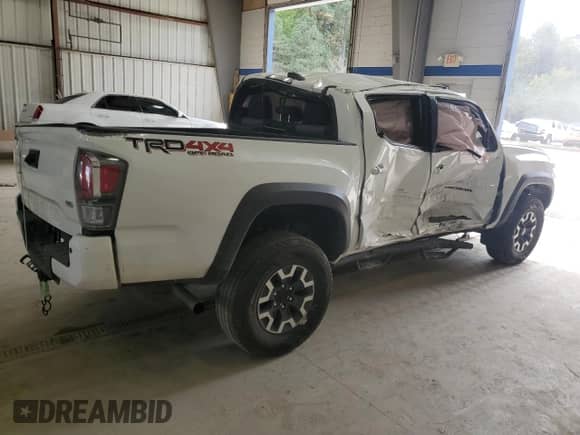 2023 Toyota Tacoma TRD Off Road z VIN 3TMCZ5AN5PM625110, wystawiony jako Copart lot #82304995 z przebiegiem 48 416 mil mil oraz Szkoda całkowita • Salvage title. Historia ofert i sprzedaży dostępna na DreamBid. Obrazek 3.