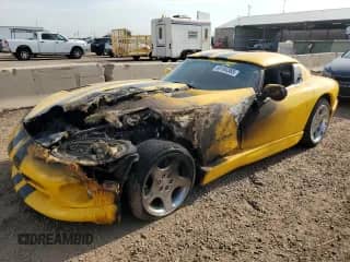 2002 Dodge Viper RT/10 with VIN 1B3ER65E42V101682, listed as a Copart auction lot 69194365 with Not provided miles and Salvage title. Bid and sale history available at DreamBid. Image 1.