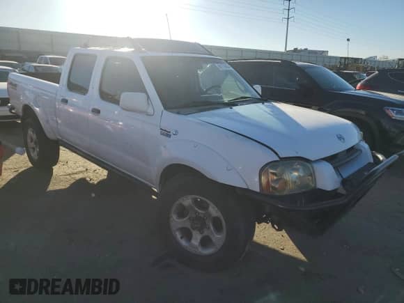2003 Nissan Frontier SVE with VIN 1N6MD29Y03C449057, listed as a Copart auction lot 81178454 with Not provided miles and Salvage title. Bid and sale history available at DreamBid. Image 4.