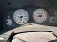 1999 Nissan Pathfinder XE z VIN JN8AR07Y7XW385686, wystawiony jako Copart lot #82694075 z przebiegiem 160 620 mil mil oraz Szkoda całkowita • Salvage title. Historia ofert i sprzedaży dostępna na DreamBid. Obrazek 9.