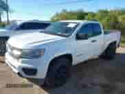 2016 Chevrolet Colorado 2WD z VIN 1GCHSAEA0G1107543, wystawiony jako IAAI lot #43441249 z przebiegiem 156 122 mil mil oraz . Historia ofert i sprzedaży dostępna na DreamBid. Obrazek 2.