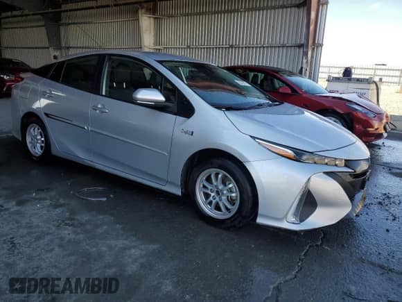 2022 Toyota Prius XLE with VIN JTDKAMFP4N3209605, listed as a Copart auction lot 81458595 with 97,216 mi miles and Clean title. Bid and sale history available at DreamBid. Image 4.