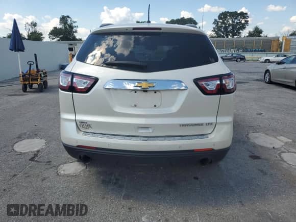 2015 Chevrolet Traverse LTZ с VIN 1GNKVJKD9FJ191184, выставлен на аукционе Copart как лот 69845825 с пробегом 150 412 миль миль и Списание • Salvage title. История ставок и продаж доступна на DreamBid. Изображение 6.