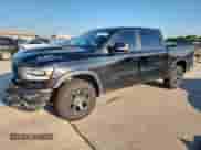 2020 Ram 1500 Rebel z VIN 1C6SRFLT0LN357023, wystawiony jako Copart lot #69025675 z przebiegiem 114 804 mil mil oraz Szkoda całkowita • Salvage title. Historia ofert i sprzedaży dostępna na DreamBid. Obrazek 1.
