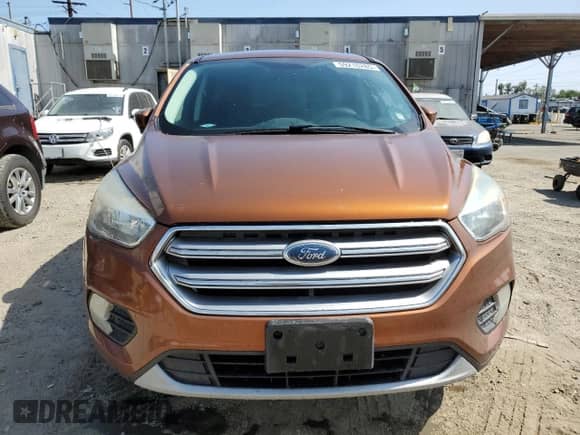 2017 Ford Escape SE with VIN 1FMCU9GD5HUA69460, listed as a Copart auction lot 59218285 with 122,938 mi miles and Clean title. Bid and sale history available at DreamBid. Image 5.