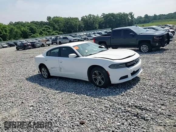 2016 Dodge Charger SE z VIN 2C3CDXBG2GH310326, wystawiony jako Copart lot #62064005 z przebiegiem 109 417 mil mil oraz Szkoda całkowita • Salvage title. Historia ofert i sprzedaży dostępna na DreamBid. Obrazek 13.
