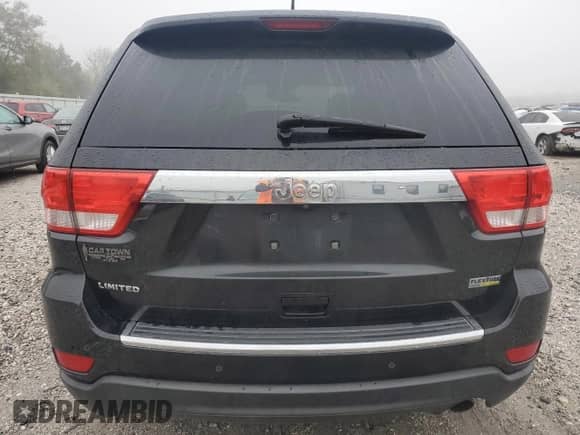2013 Jeep Grand Cherokee Limited z VIN 1C4RJEBG0DC642363, wystawiony jako Copart lot #89741715 z przebiegiem 203 848 mil mil oraz Czysty tytuł • Clean title. Historia ofert i sprzedaży dostępna na DreamBid. Obrazek 6.