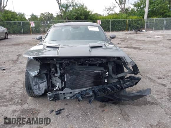 2018 Dodge Challenger T/A with VIN 2C3CDZBTXJH311594, listed as a IAAI auction lot 43202742 with 76,854 mi miles and . Bid and sale history available at DreamBid. Image 6.