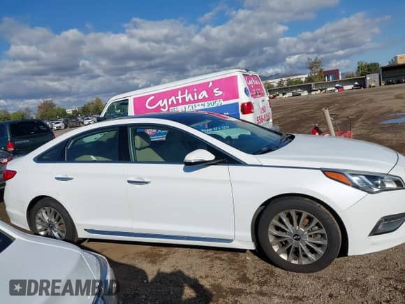 2015 Hyundai Sonata Sport z VIN 5NPE34AF4FH153984, wystawiony jako IAAI lot #43444521 z przebiegiem 124 295 mil mil oraz . Historia ofert i sprzedaży dostępna na DreamBid. Obrazek 13.