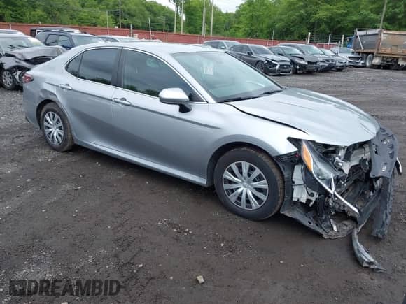 2022 Toyota Camry Hybrid LE with VIN 4T1C31AK4NU588863, listed as a IAAI auction lot 42375893 with 218,285 mi miles and . Bid and sale history available at DreamBid. Image 1.