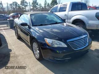 2014 Chrysler 200 Touring z VIN 1C3BCBEG7EN127389, wystawiony jako IAAI lot #41430522 z przebiegiem 121 491 mil mil oraz . Historia ofert i sprzedaży dostępna na DreamBid. Obrazek 1.