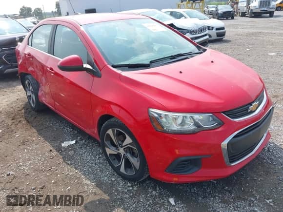 2017 Chevrolet Sonic Premier z VIN 1G1JF5SB2H4141437, wystawiony jako IAAI lot #42936257 z przebiegiem 97 981 mil mil oraz . Historia ofert i sprzedaży dostępna na DreamBid. Obrazek 1.