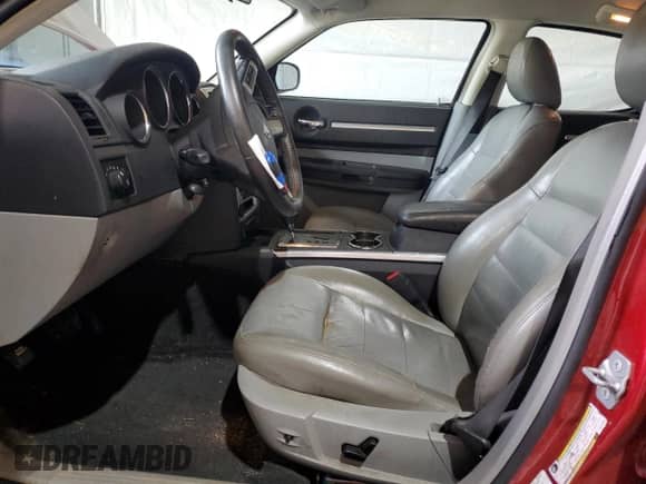2010 Dodge Charger R/T with VIN 2B3CA5CT8AH172076, listed as a Copart auction lot 84264895 with 191,913 mi miles and Salvage title. Bid and sale history available at DreamBid. Image 7.