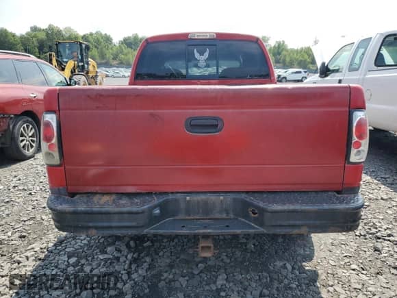 2003 Dodge Dakota Sport with VIN 1D7HG38N43S363450, listed as a Copart auction lot 68654675 with 223,509 mi miles and Salvage title. Bid and sale history available at DreamBid. Image 6.