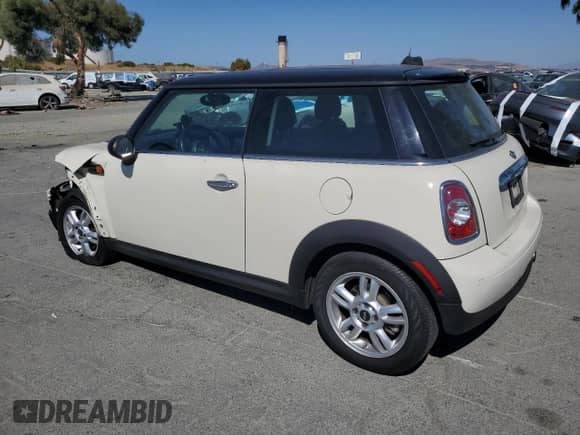 2013 MINI Hardtop with VIN WMWSU3C52DT691846, listed as a Copart auction lot 82140655 with 85,539 mi miles and Salvage title. Bid and sale history available at DreamBid. Image 2.