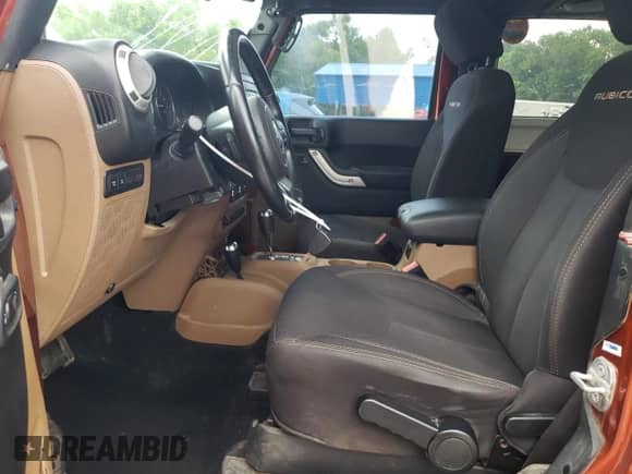 2014 Jeep Wrangler Rubicon with VIN 1C4BJWCG2EL303420, listed as a Copart auction lot 63550985 with 87,175 mi miles and Salvage title. Bid and sale history available at DreamBid. Image 7.