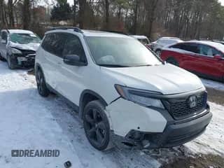 2021 Honda Passport Elite z VIN 5FNYF8H05MB037296, wystawiony jako IAAI lot #41261153 z przebiegiem 40 215 mil mil oraz . Historia ofert i sprzedaży dostępna na DreamBid. Obrazek 1.