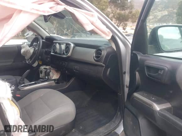 2019 Toyota Tacoma SR5 with VIN 3TMAZ5CN9KM108003, listed as a IAAI auction lot 43249340 with 80,485 mi miles and . Bid and sale history available at DreamBid. Image 5.