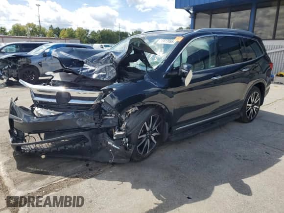 2022 Honda Pilot Elite z VIN 5FNYF6H06NB024580, wystawiony jako Copart lot #71443955 z przebiegiem Nie podano mil oraz Szkoda całkowita • Salvage title. Historia ofert i sprzedaży dostępna na DreamBid. Obrazek 1.
