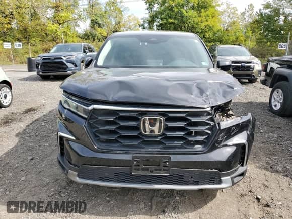2024 Honda Pilot EX-L с VIN 5FNYG1H54RB006371, выставлен на аукционе Copart как лот 84606195 с пробегом 18 728 миль миль и Списание • Salvage title. История ставок и продаж доступна на DreamBid. Изображение 5.