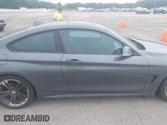 2014 BMW 4 Series 428i z VIN WBA3N7C52EK221929, wystawiony jako IAAI lot #42530110 z przebiegiem 126 828 mil mil oraz . Historia ofert i sprzedaży dostępna na DreamBid. Obrazek 13.