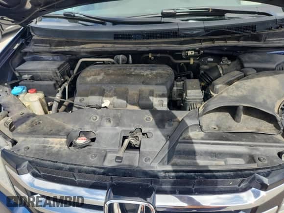 2015 Honda Odyssey LX with VIN 5FNRL5H24FB090989, listed as a Copart auction lot 85265575 with 129,952 mi miles and Salvage title. Bid and sale history available at DreamBid. Image 12.