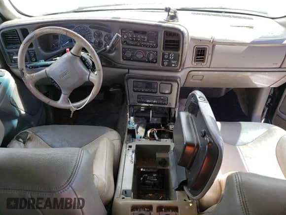 2002 GMC Sierra 1500 Denali z VIN 2GTFK69U021329107, wystawiony jako Copart lot #65479695 z przebiegiem 224 881 mil mil oraz Czysty tytuł • Clean title. Historia ofert i sprzedaży dostępna na DreamBid. Obrazek 8.