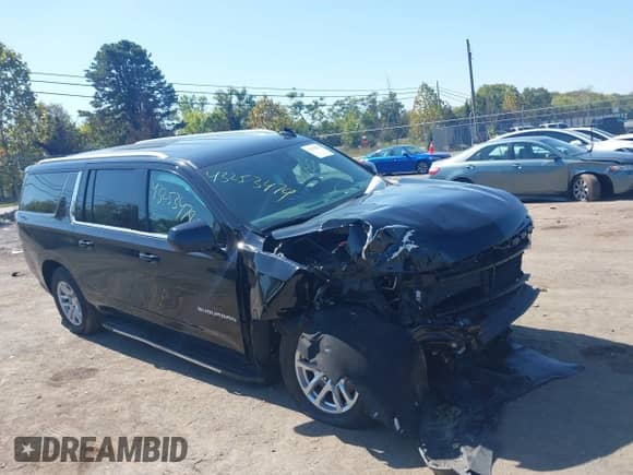 2023 Chevrolet Suburban LS z VIN 1GNSKBKD3PR165715, wystawiony jako IAAI lot #43253479 z przebiegiem 132 431 mil mil oraz . Historia ofert i sprzedaży dostępna na DreamBid. Obrazek 1.