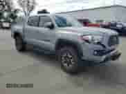 2019 Toyota Tacoma TRD Off Road z VIN 3TMCZ5AN7KM210332, wystawiony jako Copart lot #81743135 z przebiegiem 90 681 mil mil oraz Szkoda całkowita • Salvage title. Historia ofert i sprzedaży dostępna na DreamBid. Obrazek 4.