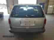 2000 Dodge Caravan SE z VIN 2B4GP45G6YR669041, wystawiony jako Copart lot #56864805 z przebiegiem 143 807 mil mil oraz Szkoda całkowita • Salvage title. Historia ofert i sprzedaży dostępna na DreamBid. Obrazek 6.