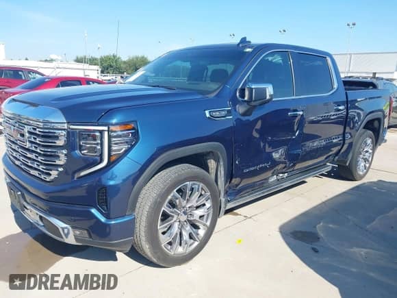 2023 GMC Sierra 1500 Denali with VIN 3GTPHGED2PG210522, listed as a IAAI auction lot 43096747 with 17,371 mi miles and . Bid and sale history available at DreamBid. Image 17.