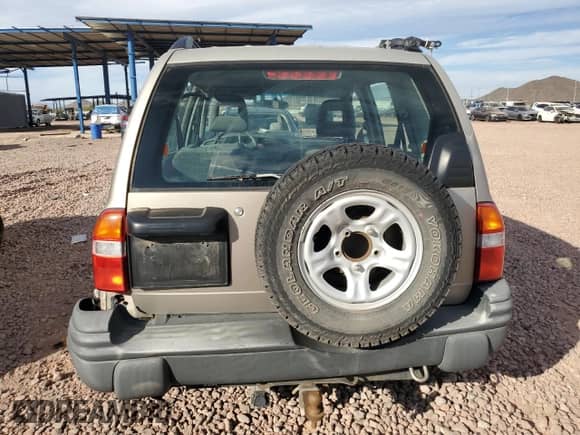 2002 Chevrolet Tracker с VIN 2CNBJ13C426937358, выставлен на аукционе Copart как лот 77492344 с пробегом 113 032 миль миль и Списание • Salvage title. История ставок и продаж доступна на DreamBid. Изображение 6.
