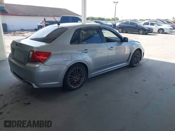 2013 Subaru WRX WRX with VIN JF1GV7E60DG014909, listed as a IAAI auction lot 42127645 with 70,360 mi miles and . Bid and sale history available at DreamBid. Image 4.