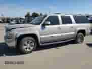 2004 Chevrolet Suburban LT z VIN 1GNFK16Z94J156657, wystawiony jako Copart lot #74087664 z przebiegiem 267 416 mil mil oraz Szkoda całkowita • Salvage title. Historia ofert i sprzedaży dostępna na DreamBid. Obrazek 1.