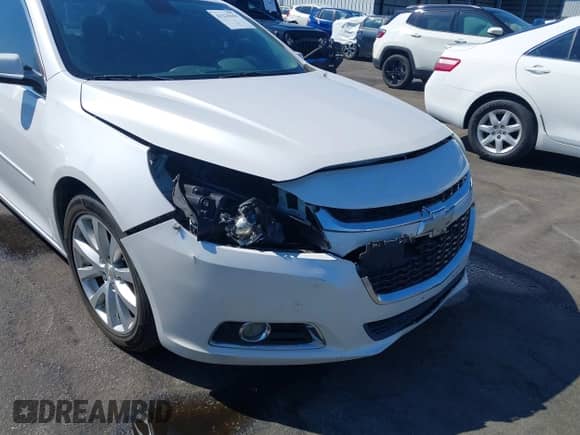 2015 Chevrolet Malibu LT z VIN 1G11D5SLXFF260725, wystawiony jako IAAI lot #43235655 z przebiegiem 217 363 mil mil oraz . Historia ofert i sprzedaży dostępna na DreamBid. Obrazek 6.