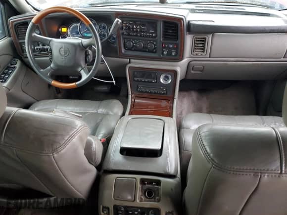 2002 Cadillac Escalade с VIN 1GYEK63N82R219839, выставлен на аукционе Copart как лот 82534735 с пробегом 224 564 миль миль и Списание • Salvage title. История ставок и продаж доступна на DreamBid. Изображение 8.