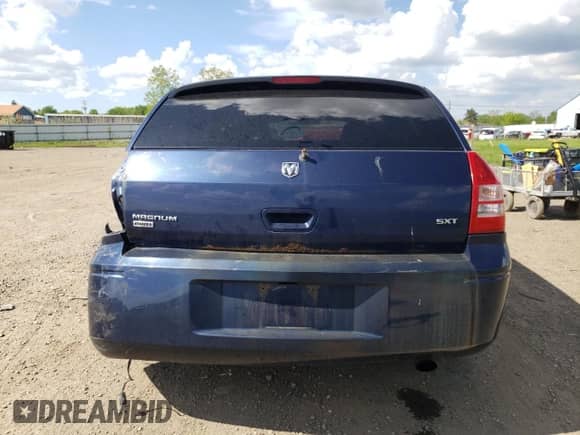 2005 Dodge Magnum SXT with VIN 2D4GZ48V05H688812, listed as a Copart auction lot 57261475 with 146,633 mi miles and Salvage title. Bid and sale history available at DreamBid. Image 6.