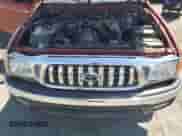 2002 Toyota Tacoma PreRunner z VIN 5TEGM92N62Z118802, wystawiony jako Copart lot #66684755 z przebiegiem 216 147 mil mil oraz Szkoda całkowita • Salvage title. Historia ofert i sprzedaży dostępna na DreamBid. Obrazek 11.
