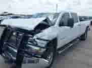 2015 Chevrolet Silverado 2500HD Work Truck z VIN 1GC1KUEG2FF175111, wystawiony jako IAAI lot #42463097 z przebiegiem 245 542 mil mil oraz . Historia ofert i sprzedaży dostępna na DreamBid. Obrazek 2.