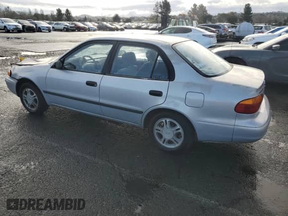 2002 Chevrolet Prizm with VIN 1Y1SK52842Z404089, listed as a Copart auction lot 49103545 with 134,794 mi miles and Salvage title. Bid and sale history available at DreamBid. Image 2.